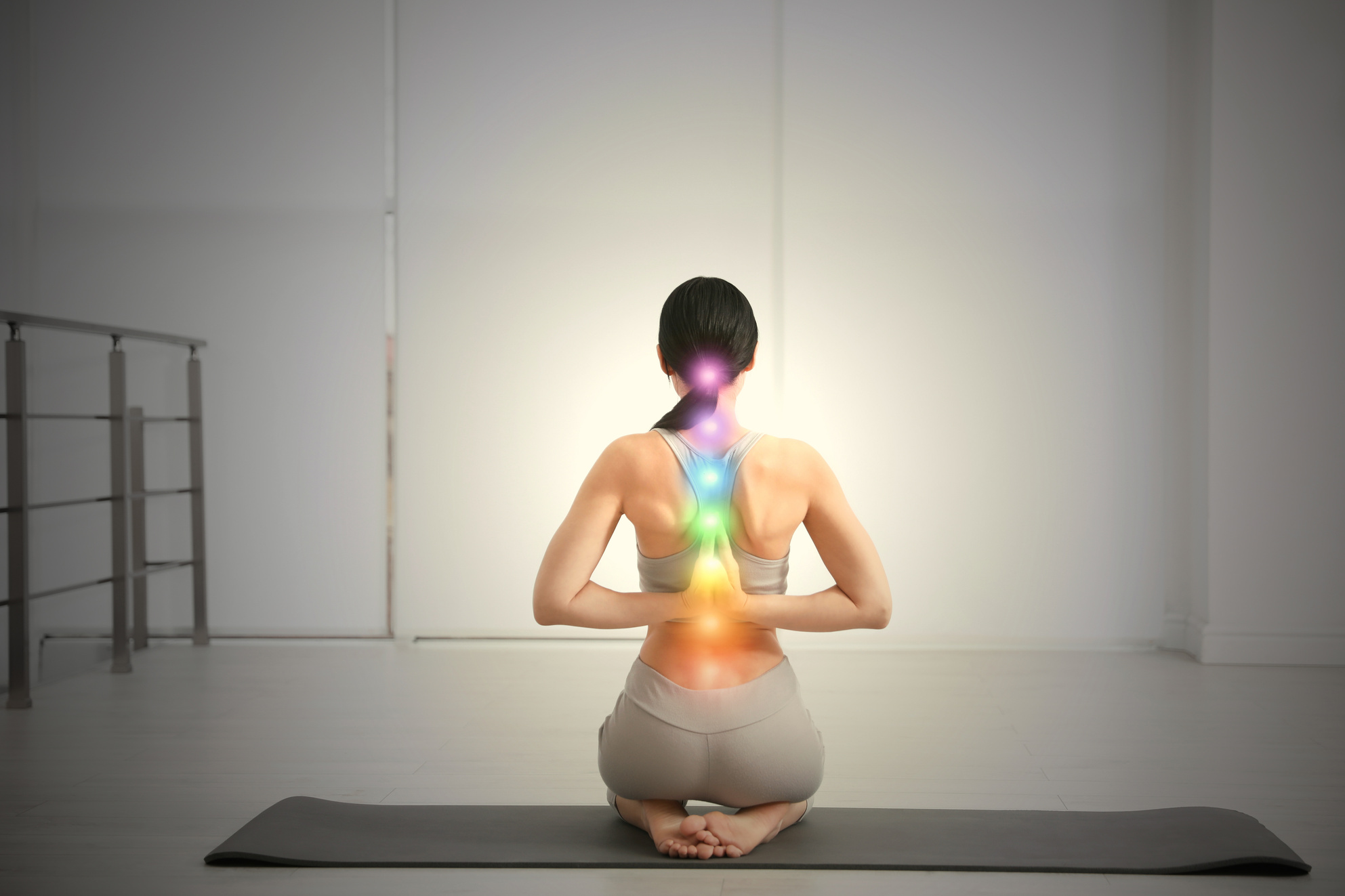 Young Woman Practicing Seiza Asana in Yoga Studio, Back View. Va